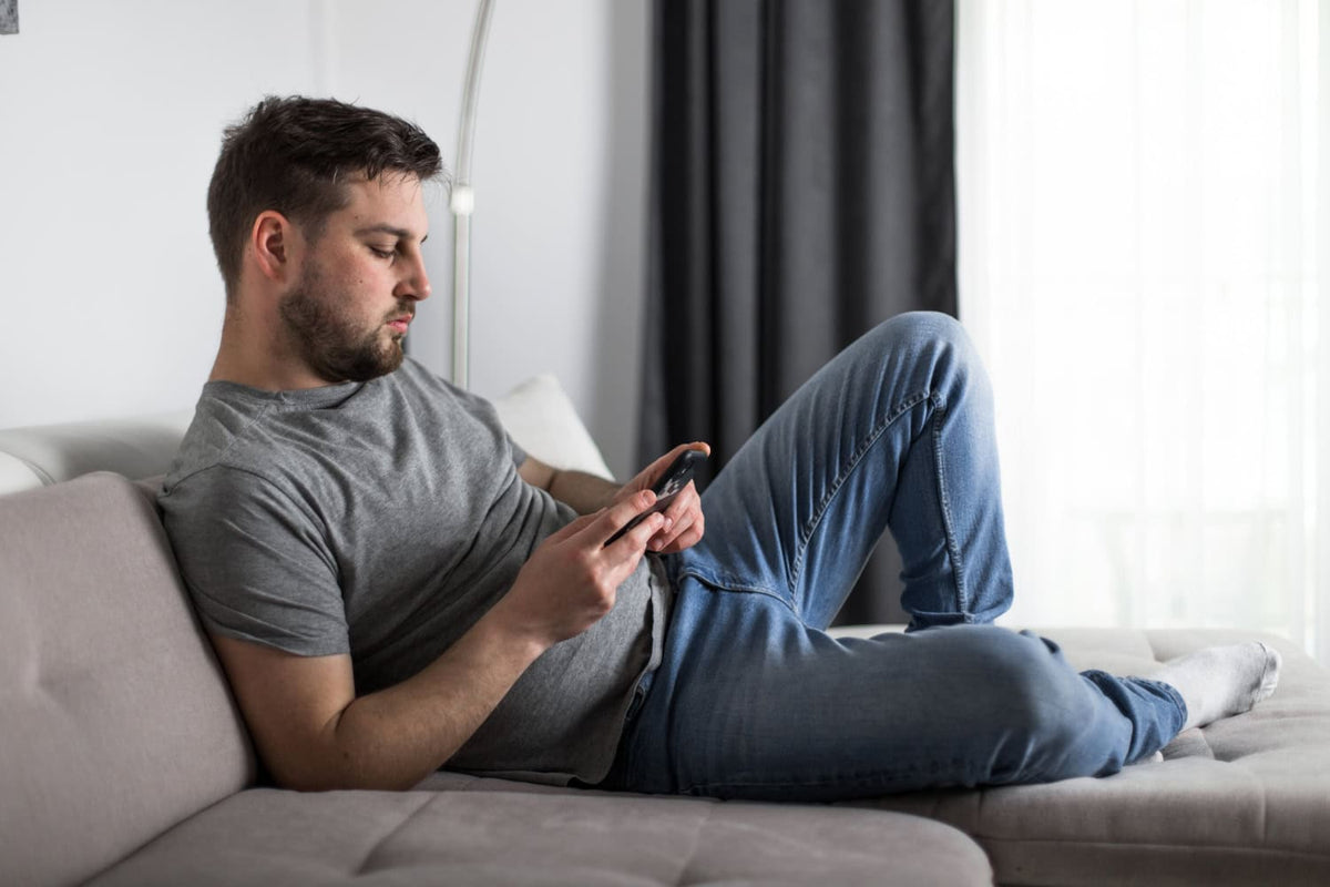 Person waiting for a text message while watching a typing indicator
